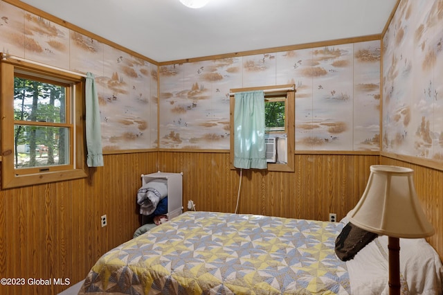 9 E Center St, Day, NY 12835 - bedroom featuring wainscoting, wood walls, ornamental molding, and cooling unit