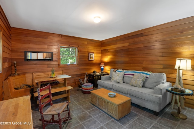 9 E Center St, Day, NY 12835 - living room with wood walls and dark tile patterned floors
