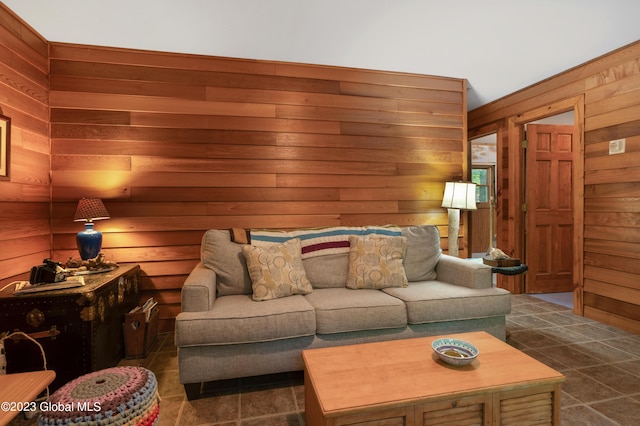 9 E Center St, Day, NY 12835 - living room featuring wooden walls and dark tile patterned flooring