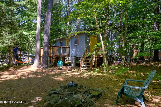 9 E Center St, Day, NY 12835 - back of property with a deck and stairs