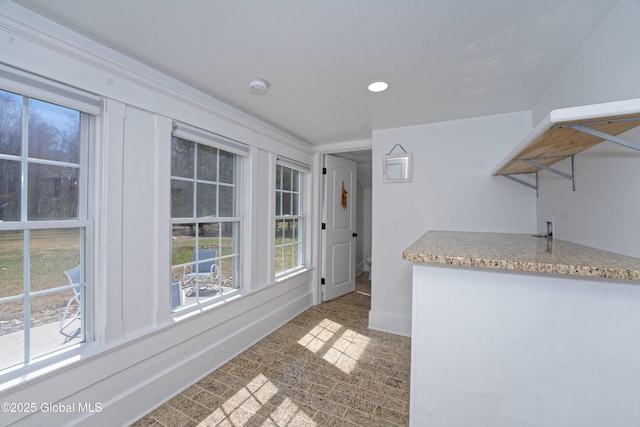 interior space with recessed lighting, carpet, and baseboards
