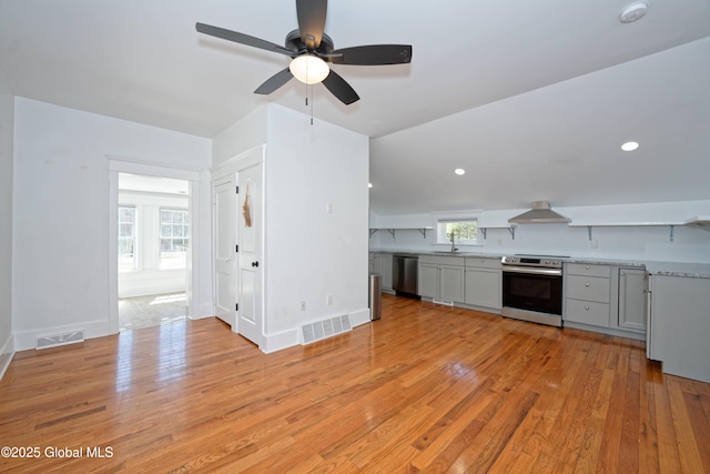 kitchen with ceiling fan, light countertops, visible vents, and appliances with stainless steel finishes