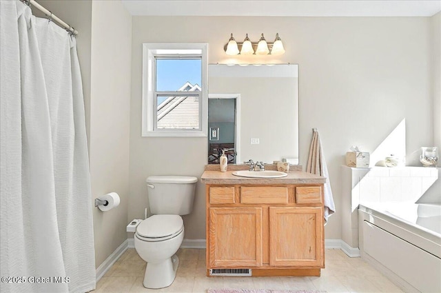 bathroom featuring toilet, baseboards, tile patterned floors, and vanity
