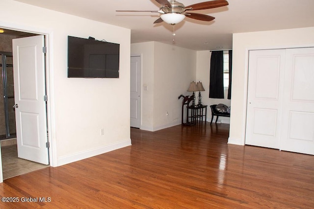 20 Fort Vaux Ln, Colonie, NY 12189 - spare room featuring a ceiling fan, wood finished floors, and baseboards
