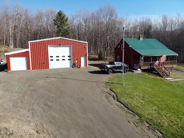 190 Wes Brown Rd, Cherry Valley, NY 13320 - detached garage with a porch