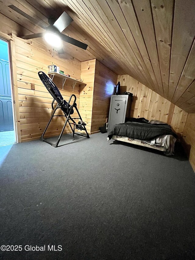 190 Wes Brown Rd, Cherry Valley, NY 13320 - unfurnished bedroom with wood walls, wood ceiling, carpet flooring, and vaulted ceiling
