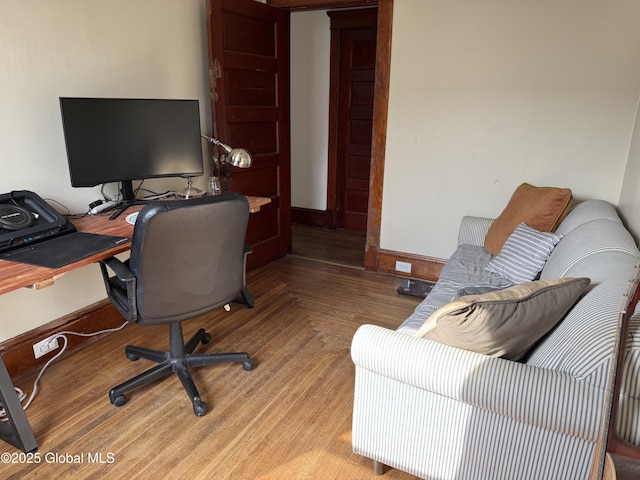 office space featuring baseboards