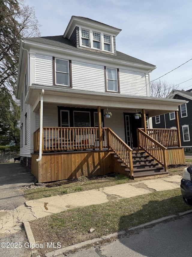 view of front of home featuring covered porch