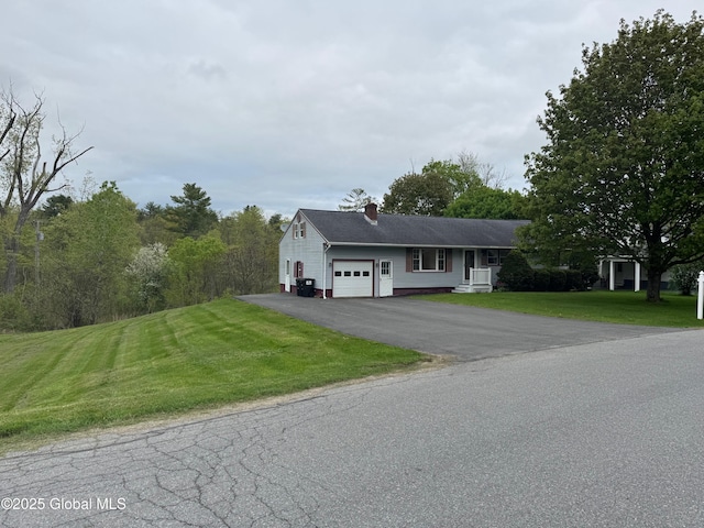 19 Callaghan Blvd, Charlton, NY 12019 - ranch-style home with a garage, driveway, a chimney, and a front lawn