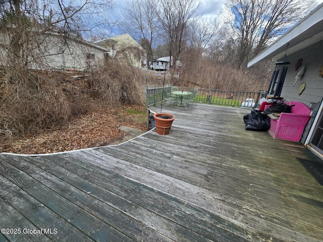 deck featuring outdoor dining area