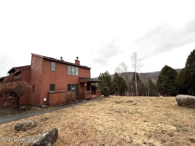 rear view of house with a chimney