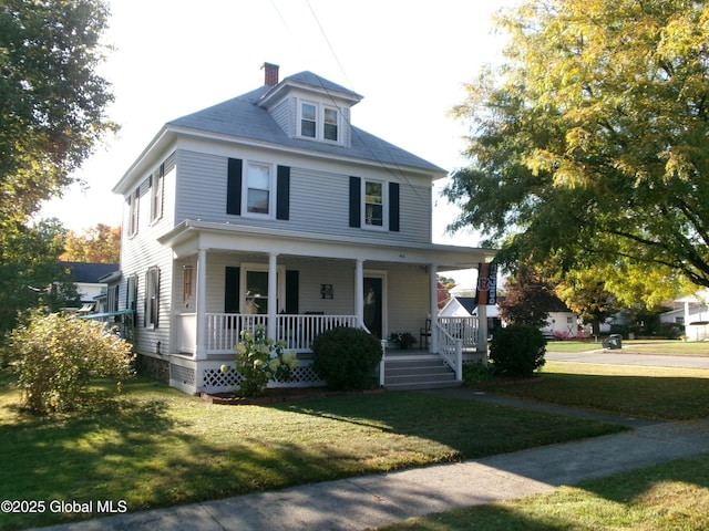 401 S 1st St, Northville, NY 12134 - traditional style home with a chimney, a front yard, and covered porch