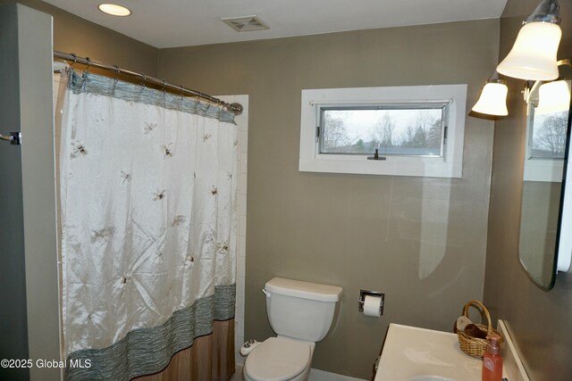 401 S 1st St, Northville, NY 12134 - full bathroom with visible vents, a wealth of natural light, vanity, and toilet