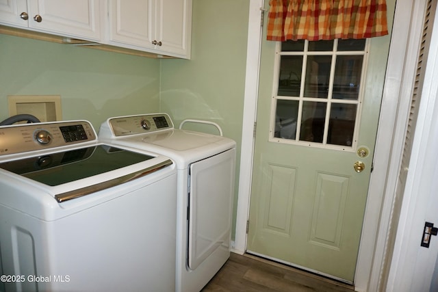 401 S 1st St, Northville, NY 12134 - clothes washing area featuring washing machine and clothes dryer, dark wood-type flooring, and cabinet space