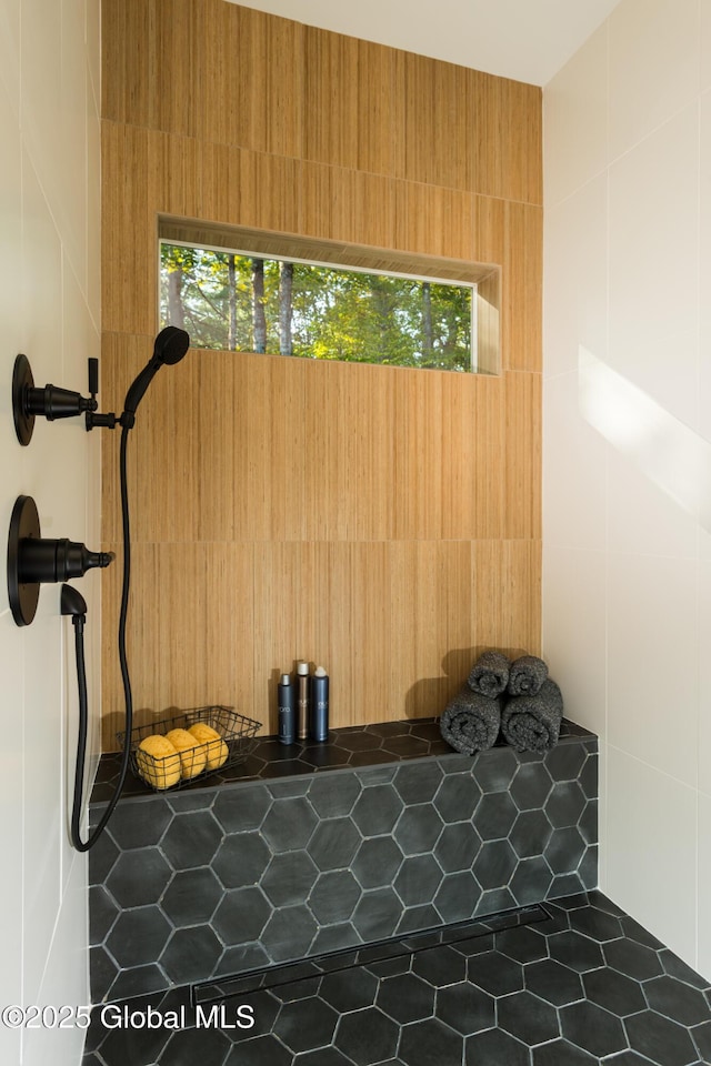 interior space with a tile shower