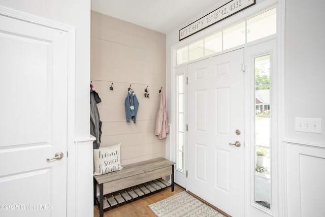 mudroom with wood finished floors
