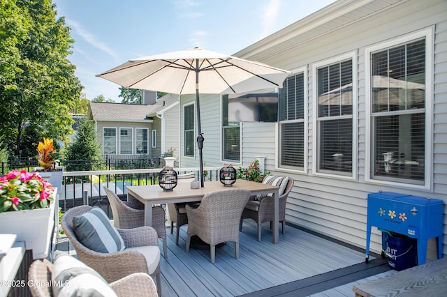 deck featuring outdoor dining area