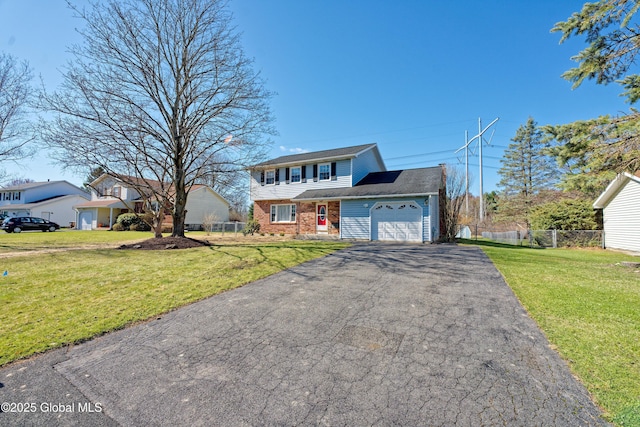 87 Dorchester Ave, Bethlehem, NY 12158 - colonial-style house with fence, brick siding, an attached garage, a front yard, and aphalt driveway