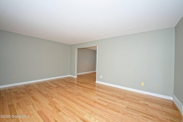 87 Dorchester Ave, Bethlehem, NY 12158 - unfurnished room with light wood-style flooring and baseboards