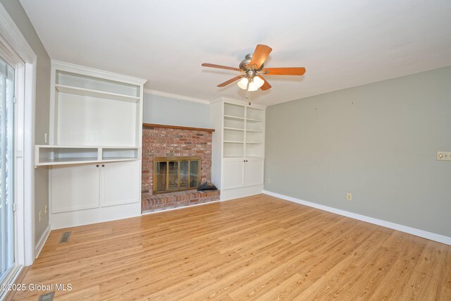 87 Dorchester Ave, Bethlehem, NY 12158 - unfurnished living room with visible vents, baseboards, a ceiling fan, and wood finished floors