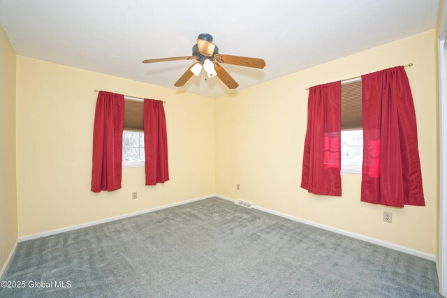87 Dorchester Ave, Bethlehem, NY 12158 - carpeted spare room featuring visible vents, a ceiling fan, and baseboards