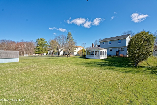 87 Dorchester Ave, Bethlehem, NY 12158 - view of yard with a gazebo, a sunroom, fence, and an outdoor structure