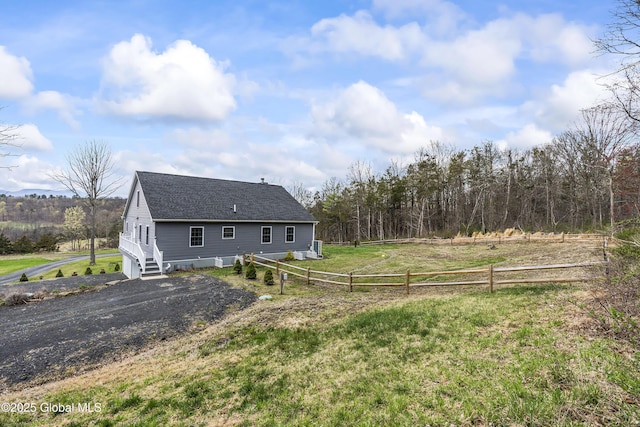 214 Vosenkill Rd, Athens, NY 12015 - exterior space with fence, roof with shingles, and a yard
