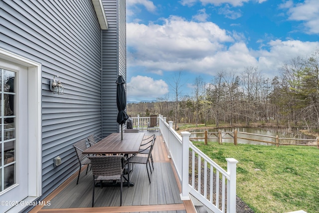 214 Vosenkill Rd, Athens, NY 12015 - wooden terrace featuring fence, outdoor dining space, a water view, and a yard