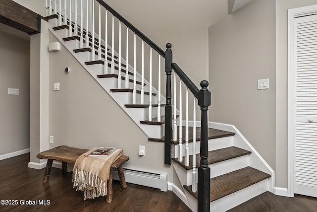 214 Vosenkill Rd, Athens, NY 12015 - stairs featuring wood finished floors, a baseboard heating unit, and baseboards