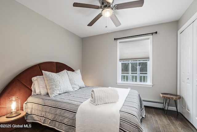214 Vosenkill Rd, Athens, NY 12015 - bedroom with a closet, a ceiling fan, baseboards, wood finished floors, and a baseboard radiator