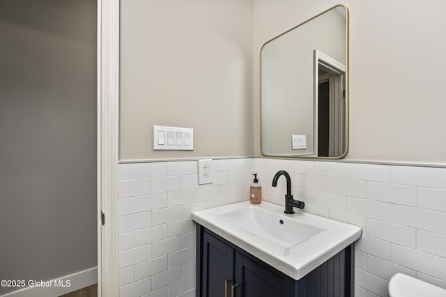 214 Vosenkill Rd, Athens, NY 12015 - bathroom with tile walls, wainscoting, toilet, and vanity