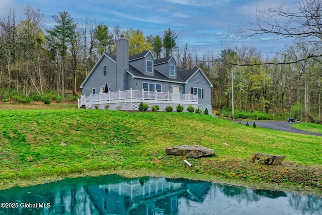 214 Vosenkill Rd, Athens, NY 12015 - exterior space featuring a deck, a yard, and a chimney