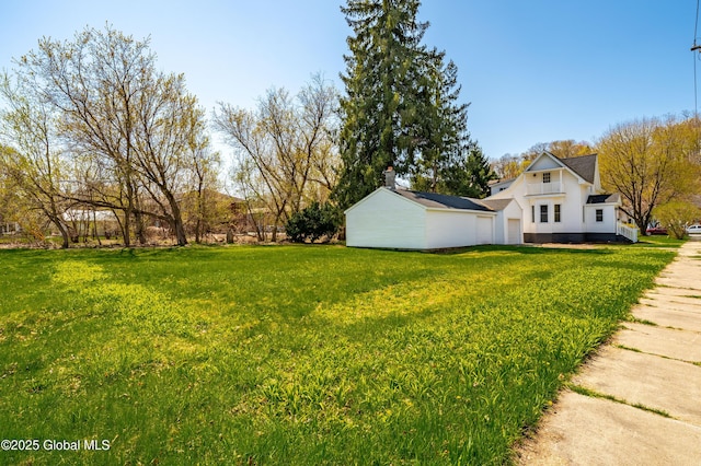 view of yard with a garage