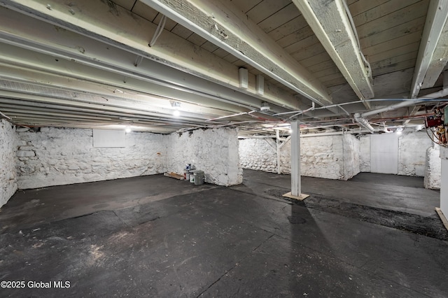 view of unfinished basement