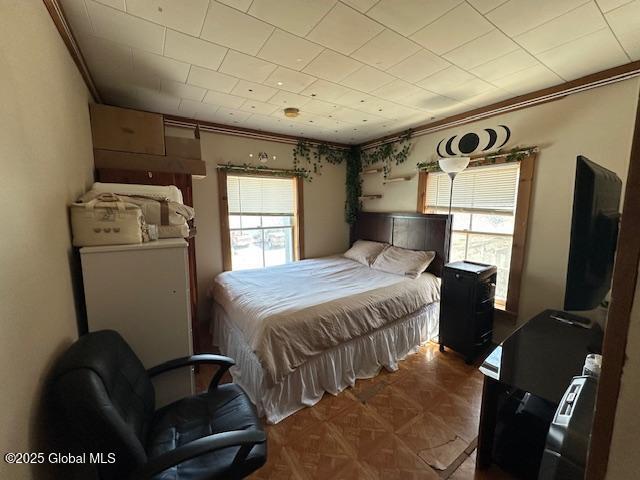 bedroom featuring ornamental molding
