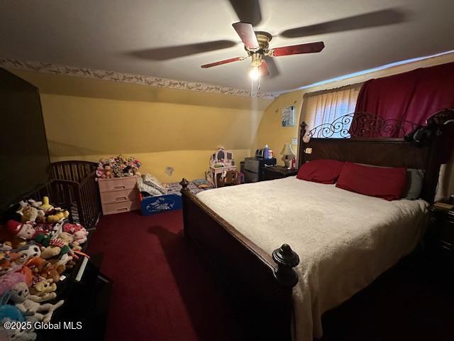 bedroom with carpet floors and a ceiling fan