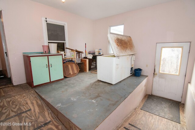 misc room with wood finished floors