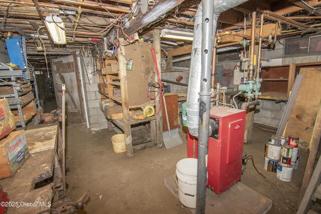 unfinished below grade area featuring a heating unit