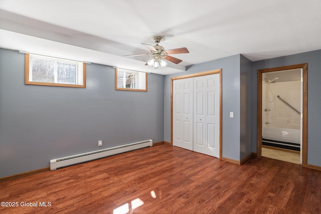230 Zicha Rd, Esperance, NY 12092 - unfurnished bedroom with a ceiling fan, baseboards, wood finished floors, a baseboard heating unit, and a closet
