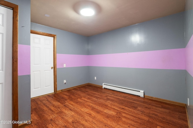 230 Zicha Rd, Esperance, NY 12092 - spare room with baseboards, baseboard heating, and wood finished floors
