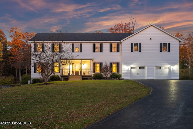 230 Zicha Rd, Esperance, NY 12092 - view of front of property featuring a garage, driveway, and a front yard