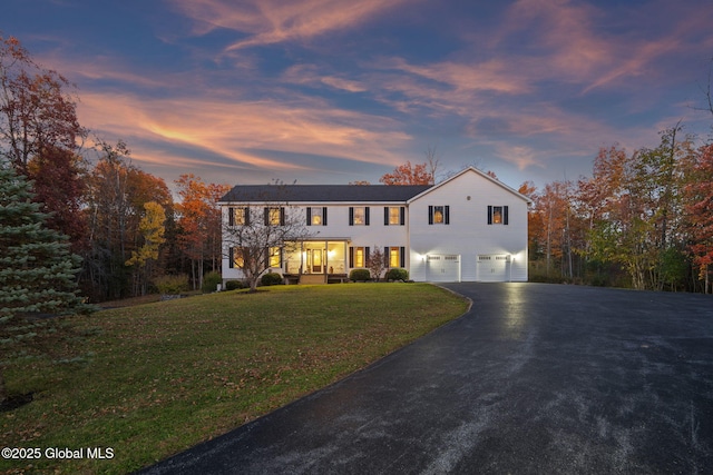 230 Zicha Rd, Esperance, NY 12092 - view of front of property with a garage, a lawn, and aphalt driveway