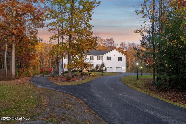 230 Zicha Rd, Esperance, NY 12092 - view of front facade with an attached garage, a yard, and driveway