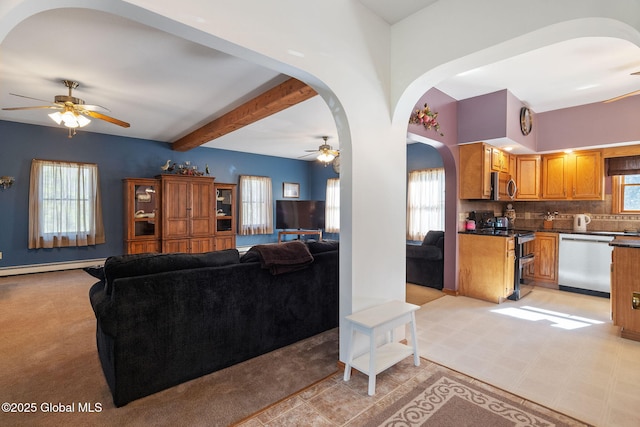 230 Zicha Rd, Esperance, NY 12092 - living area with arched walkways, ceiling fan, a baseboard radiator, and beamed ceiling