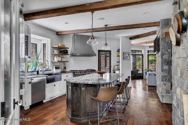 1 Joshua Rd, Saratoga Springs, NY 12866 - kitchen featuring a sink, dark wood-style flooring, beamed ceiling, wall chimney range hood, and dishwasher