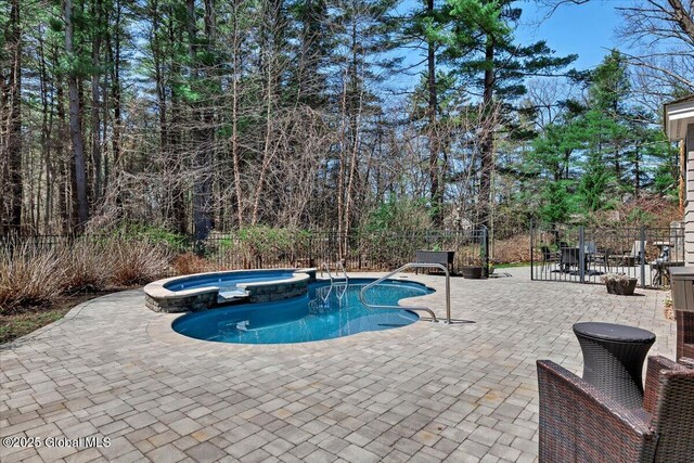 1 Joshua Rd, Saratoga Springs, NY 12866 - view of pool with fence, a patio, and a pool with connected hot tub