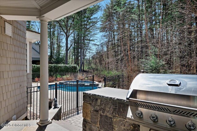 1 Joshua Rd, Saratoga Springs, NY 12866 - view of patio featuring a grill, fence, and a fenced in pool