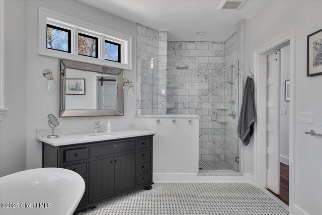 1 Joshua Rd, Saratoga Springs, NY 12866 - bathroom featuring a freestanding tub, visible vents, vanity, and tiled shower