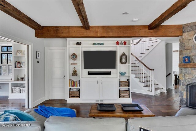 1 Joshua Rd, Saratoga Springs, NY 12866 - living room with dark wood finished floors, baseboards, beam ceiling, and stairs
