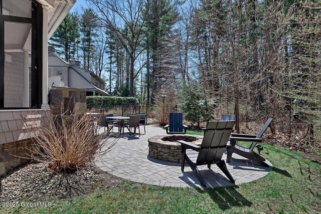 1 Joshua Rd, Saratoga Springs, NY 12866 - view of patio with fence and a fire pit